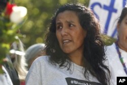Jeanette Vizguerra, a Mexican immigrant who has lived in a church to avoid immigration authorities for the past three months, speaks after leaving the church, May 12, 2017, in downtown Denver. Vizguerra won a two-year deportation delay.