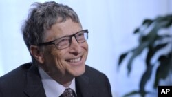 FILE - Bill Gates participates in a media availability on agricultural research, March 13, 2014, on Capitol Hill in Washington.