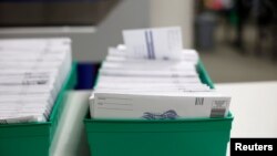 Mail-in ballots are pictured as they are counted in Lehigh County, Pennsylvania, U.S., November 4, 2020. 
