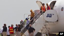 Rombongan imigran gelap yang dideportasi dari Amerika tiba di bandara San Pedro Sula, Honduras (18/7).