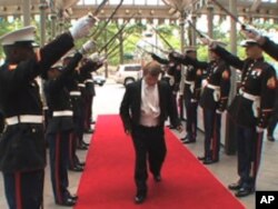 US Marines form a sword arch as each student arrives at the fancy hotel near the White House.