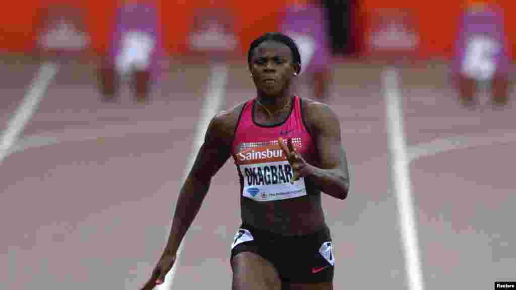 Nigeria's Blessing Okagbare leads the women's 100m event at the London Diamond League 'Anniversary Games.'