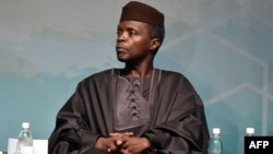 FILE- Nigeria Vice President Yemi Osinbajo attend the investiture ceremony for the new president of the African Development Bank (AfDB) Akinwumi Adesina, on Sept. 1, 2015, in Abidjan. 