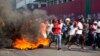 Protesters Stone Haitian President's Home, Battle Police