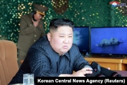 North Korea's leader Kim Jong Un supervises a "strike drill" in this May 4, 2019 photo supplied by the Korean Central News Agency (KCNA).