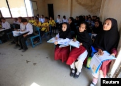 Children attend a class at Khushal school that Nobel Peace Prize laureate Malala Yousafzai used to attend, in her hometown of Mingora in Swat Valley, Pakistan, March 30, 2018.