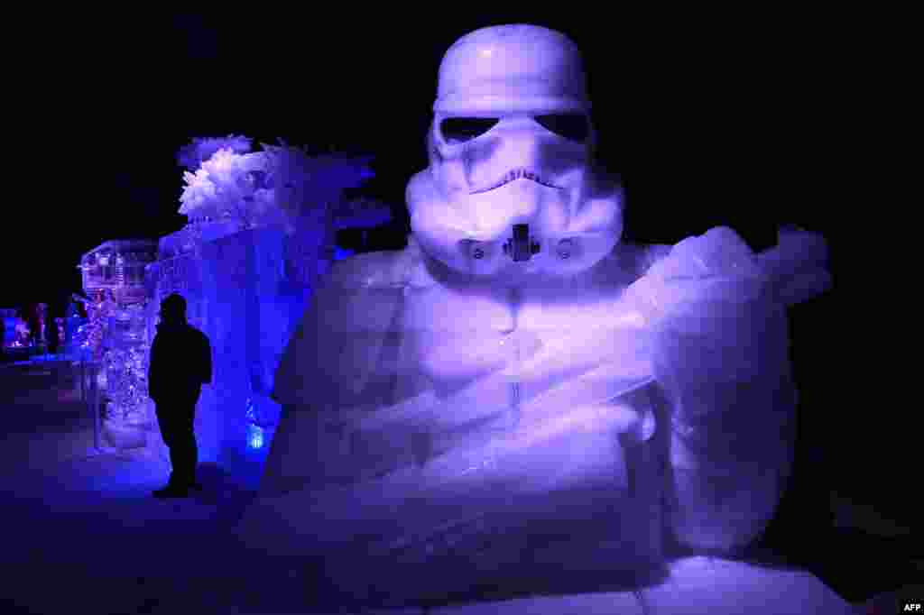 Ice-sculptures in the form of a Stormtroopers from the Star Wars series is displayed during the Star Wars Ice-sculpture festival in Liege, Belgium.