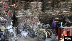 One of Shiek Chhai's three warehouses contains around 5,000 bikes, from street to city to children's two wheelers. (Kiana Duncan/VOA Khmer)