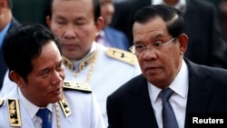 In this file photo, Cambodia's Prime Minister Hun Sen attends the annual Water Festival on the Tonle Sap river in Phnom Penh, Cambodia, November 10, 2019.