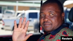 Mothetjoa Metsing, leader of the Lesotho Congress for Democracy (LCD), gestures after speaking to Reuters in the capital Maseru, Feb. 26, 2015.