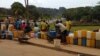 FILE - Residents of Cameroon's capital Yaounde often queue for hours to fill jerry cans with water during periods of severe shortages. (UNICEF)