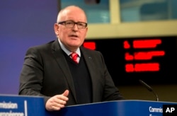 European Commission Vice-President Frans Timmermans speaks during a media conference at EU headquarters in Brussels on Dec. 20, 2017.