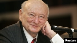 In this April 18, 2007 photo, former New York Mayor Ed Koch listens during the 9th annual National Action Network convention in New York.