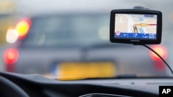 A TomTom navigation device is seen in this photo illustration taken in Amsterdam February 28, 2012.