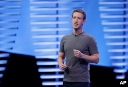 FILE - Facebook CEO Mark Zuckerberg delivers the keynote address at the F8 Facebook Developer Conference in San Francisco, California, April 12, 2016.