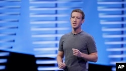 FILE - Facebook CEO Mark Zuckerberg delivers the keynote address at the F8 Facebook Developer Conference in San Francisco, California, April 12, 2016.