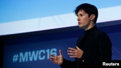 FILE - Founder and CEO of Telegram Pavel Durov delivers a keynote speech during the Mobile World Congress in Barcelona, Spain, Feb. 23, 2016. Durov was detained at Le Bourget Airport outside Paris, France, on Saturday.