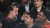 Alaa (centre à gauche) et Gamal Mubarak (à sa droite), fils de l'ancien président égyptien Hosni Moubarak, lors d’un match international amical opposant l'Egypte et la Tunisie au stade international du Caire, 8 janvier 2017.
