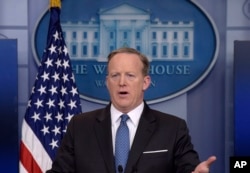 FILE - White House press secretary Sean Spicer speaks during the daily briefing at the White House in Washington.