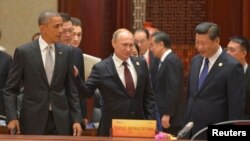 Başkan Obama, APEC zirvesinde Rusya Cumhurbaşkanı Putin ve Çin Devlet Başkanı Xi Ping ile