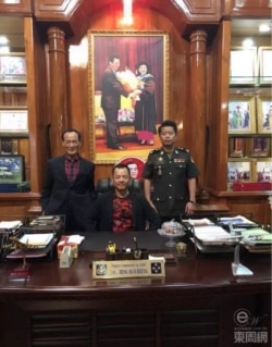 Wan Kuok-koi is photographed in the office of General Hing Bun Hieng, head of the Prime Minister Bodyguard Unit, in Phnom Penh, Cambodia. (Courtesy of Facebook)