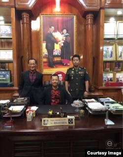 Wan Kuok-koi is photographed in the office of General Hing Bun Hieng, head of the Prime Minister Bodyguard Unit, in Phnom Penh, Cambodia. (Courtesy of Facebook)