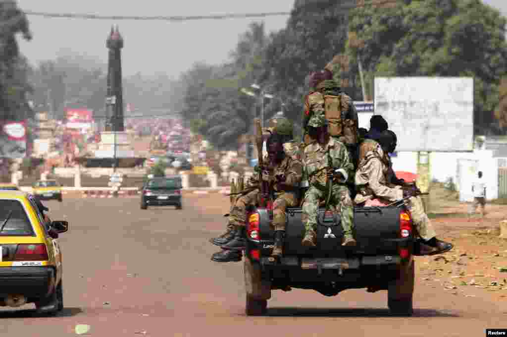 Soldiers patrol a street in Bangui, Central African Republic, January 1, 2013. 
