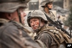 Aaron Eckhart as Staff Sergeant Michael Nantz in "Battle: Los Angeles"