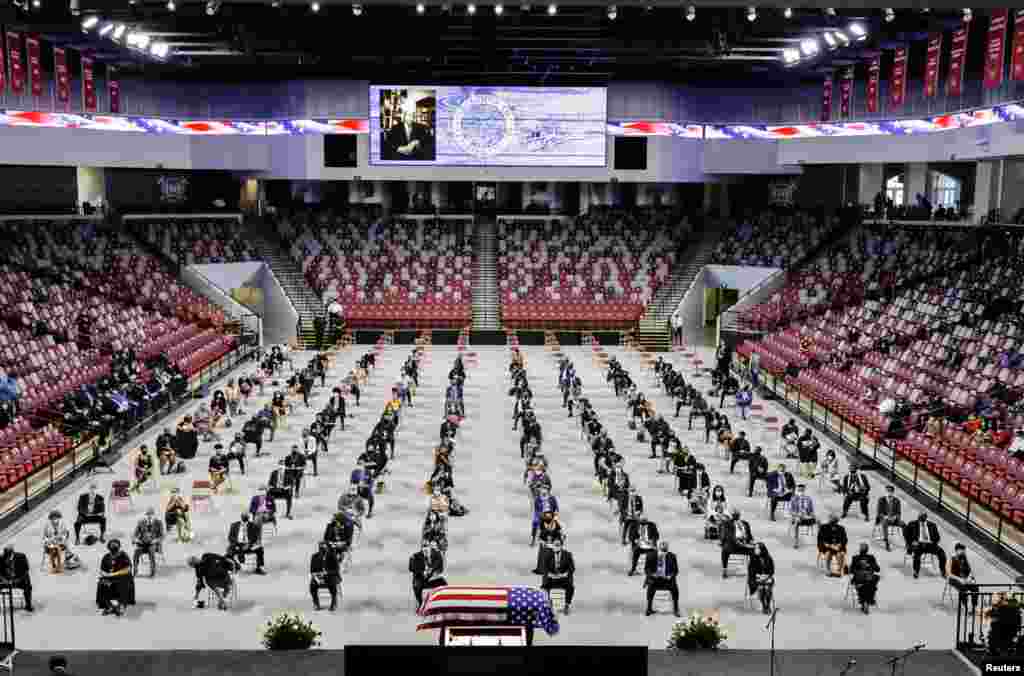 People pay their respects to the late Congressman John Lewis at Troy University's Trojan Arena in Troy, Alabama, July 25, 2020.