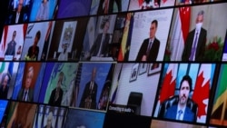 World leaders appear on screen during a virtual Climate Summit, seen from the East Room at the White House in Washington, U.S., April 22, 2021. (REUTERS/Tom Brenner)