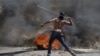 Palestinian Youth Killed in West Bank Clashes