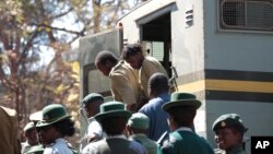 Suspected demonstrators make a court appearance in Harare, Zimbabwe, Aug. 29, 2016.