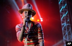 Pharrell Williams performs at the 2014 Coachella Music and Arts Festival on Saturday, April 12, 2014, in Indio, Calif.