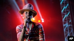 Pharrell Williams performs at the 2014 Coachella Music and Arts Festival on Saturday, April 12, 2014, in Indio, Calif.
