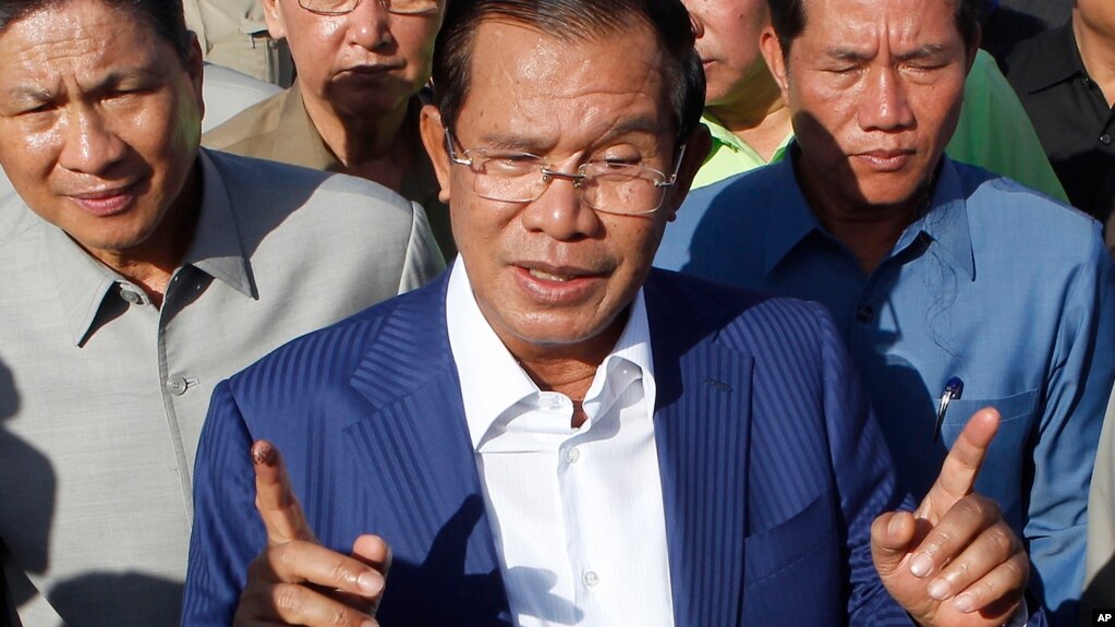 FILE - Cambodian Prime Minister Hun Sen gestures while speaking in Phnom Penh, Cambodia, Aug. 1, 2018.