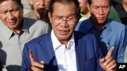 FILE - Cambodian Prime Minister Hun Sen gestures while speaking in Phnom Penh, Cambodia, Aug. 1, 2018.