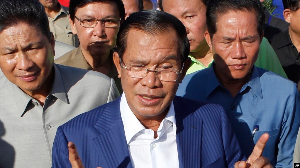 Cambodian Prime Minister Hun Sen gestures while speaking in Phnom Penh, Cambodia, on August 1. Hun Sen has been criticized for silencing opposition voices.