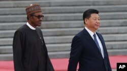 Shugaba Buhari, hagu da Xi Jinping a dama yayin wata ziyara da ya kai Beijing a 2016