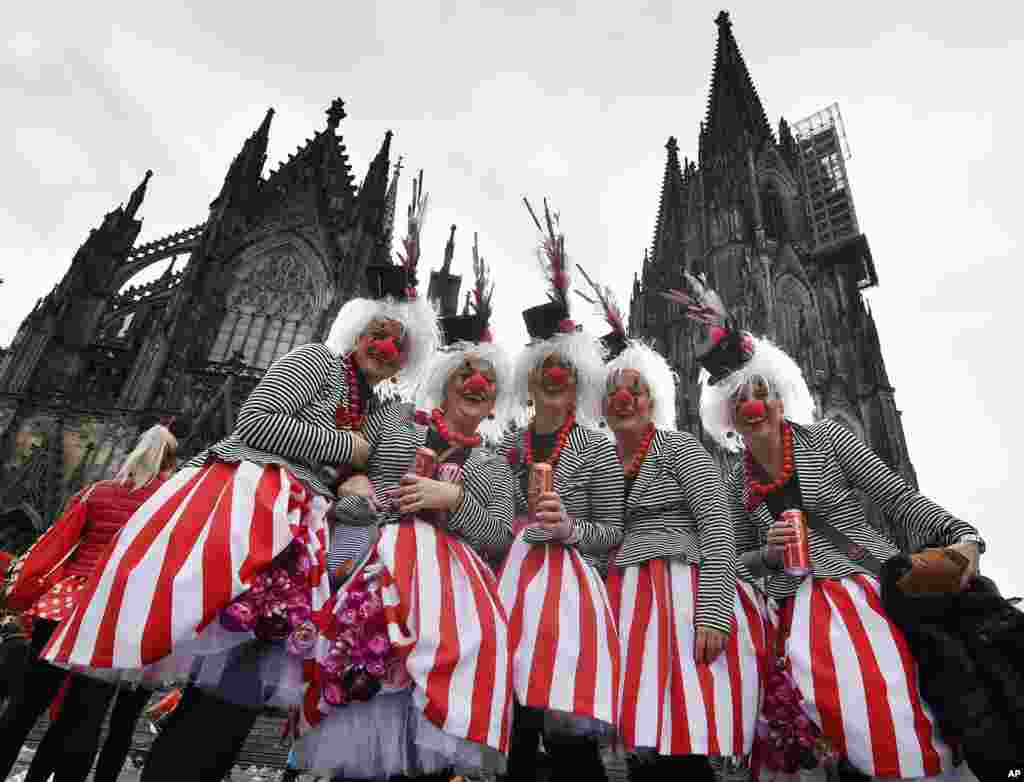 Revelers celebrate the start of the carnival season in the streets of Cologne, Germany.