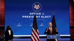 U.S. President-elect Joe Biden and Vice President-elect Senator Kamala Harris answer questions from reporters following an online meeting with members of the National Governors Association (NGA) executive committee in Wilmington, Delaware, U.S., November