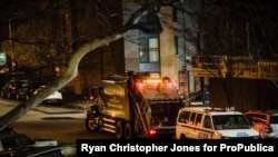 A Sanitation Salvage truck behind police tape at 152nd Street and Jackson Ave. in Woodstock, Bronx.