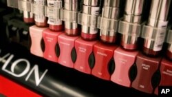 FILE - Cosmetics on display made by Revlon, which has announced it plans to leave China and cut 1,100 jobs as part of a cost-cutting measure.