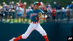 Maracaibo, Venezuela pitcher Juan Faria delivers in the second inning of an International pool play baseball game against White Rock, British Columbia at the Little League World Series tournament in South Williamsport, Pennsylvania, Aug. 20, 2017.