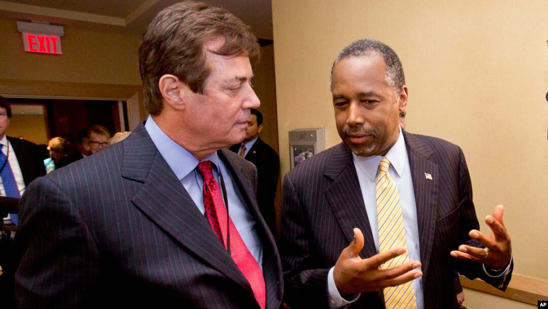 Donald Trump campaign chief Paul J. Manafort, left, chats with former presidential candidate Ben Carson as they head to a 'Trump for president reception' at the Republican National Committee Spring Meeting, Thursday, April 21, 2016, in Hollywood, Florida.