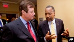 Donald Trump campaign chief Paul J. Manafort, left, chats with former presidential candidate Ben Carson as they head to a 'Trump for president reception' at the Republican National Committee Spring Meeting, Thursday, April 21, 2016, in Hollywood, Florida.