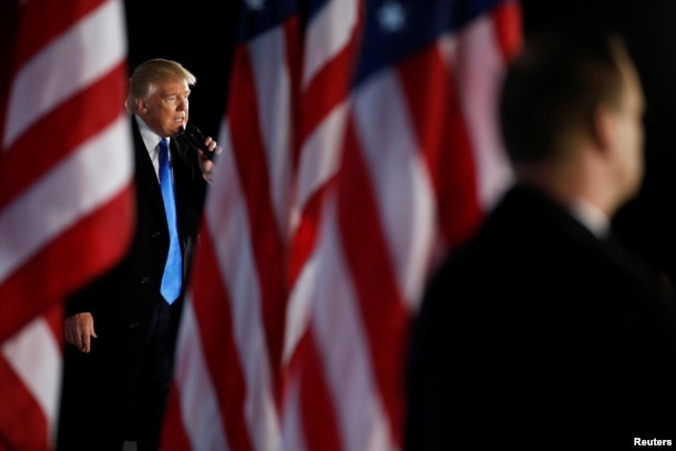 President-elect Donald Trump delivers remarks at a "Make America Great Again" welcome concert in Washington, Jan. 19, 2017.