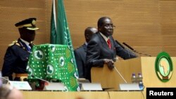 FILE: Zimbabwe's President Robert Mugabe addresses the opening ceremony of the 26th Ordinary Session of the Assembly of the African Union (AU) at the AU headquarters in Ethiopia's capital Addis Ababa, Jan. 30, 2016.