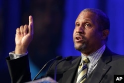 FILE - Author and talk show host Tavis Smiley speaks at Book Expo America in New York.