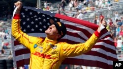 Ryan Hunter-Reay celebrates after winning the 98th running of the Indianapolis 500 IndyCar auto race at the Indianapolis Motor Speedway in Indianapolis, Indiana, May 25, 2014.