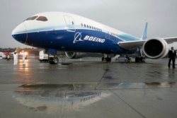 The Boeing 787 Dreamliner sits on the tarmac at Boeing Field in Seattle, Washington after its maiden flight, December 15, 2009. (Reuters)